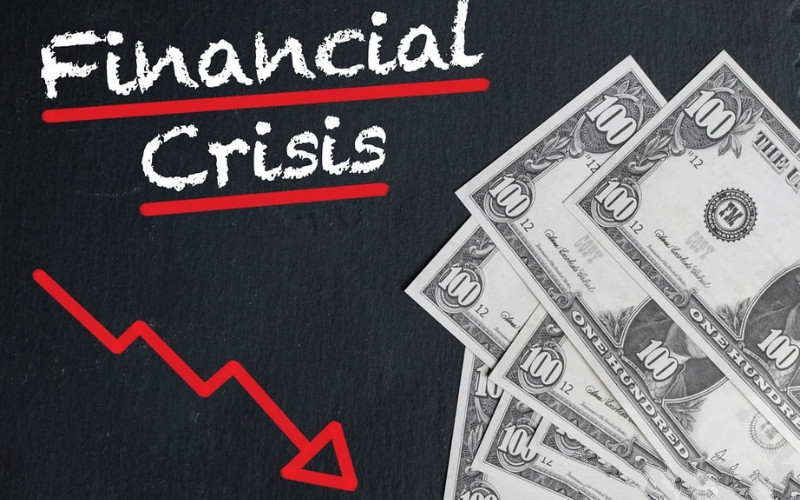 Mô tả sự sụt giảm giá trị đồng tiền trong khủng hoảng tiền tệ